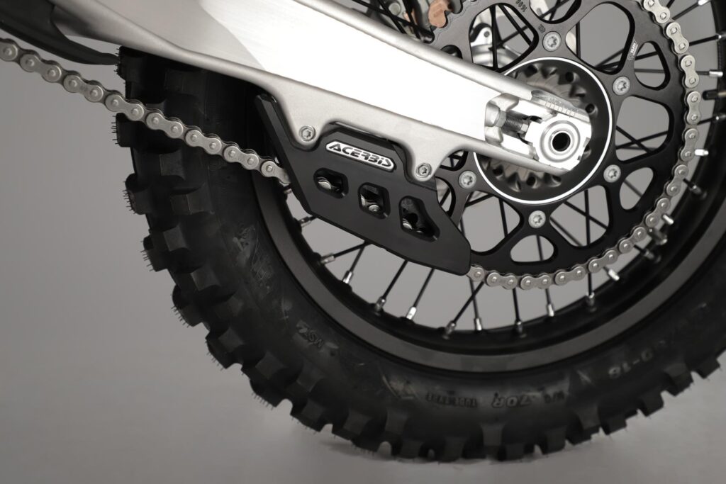 Cruna catena Race Acerbis per moto off-road, con slider intercambiabile e lavorazione dal pieno