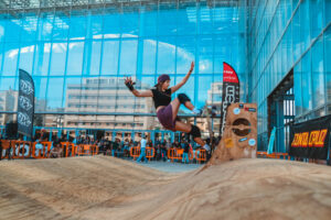 Area espositiva al Gazometro durante l'Eternal City Moto Show con stand e visitatori